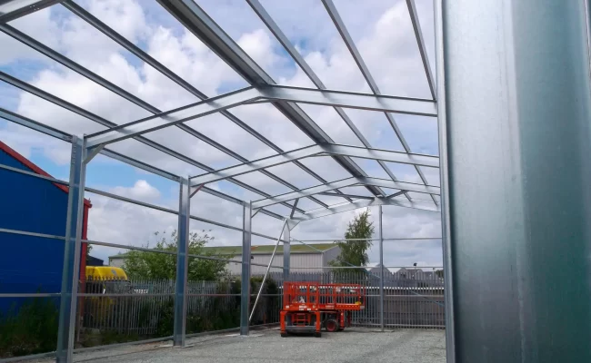Steel-Buildings-under-construction-in-Yorkshire-scaled-copy Construction of a Steel Framed Building being installed near Leeds by Springfield Steel Buildings. The next phase would be the installation of the Kingspan roof and wall cladding.