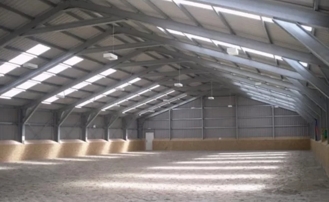 An agricultural equestrian steel framed building designed and supplied by Springfield Steel Buildings for a riding arena.